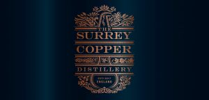 The Surrey Copper Distillery logo on blue background